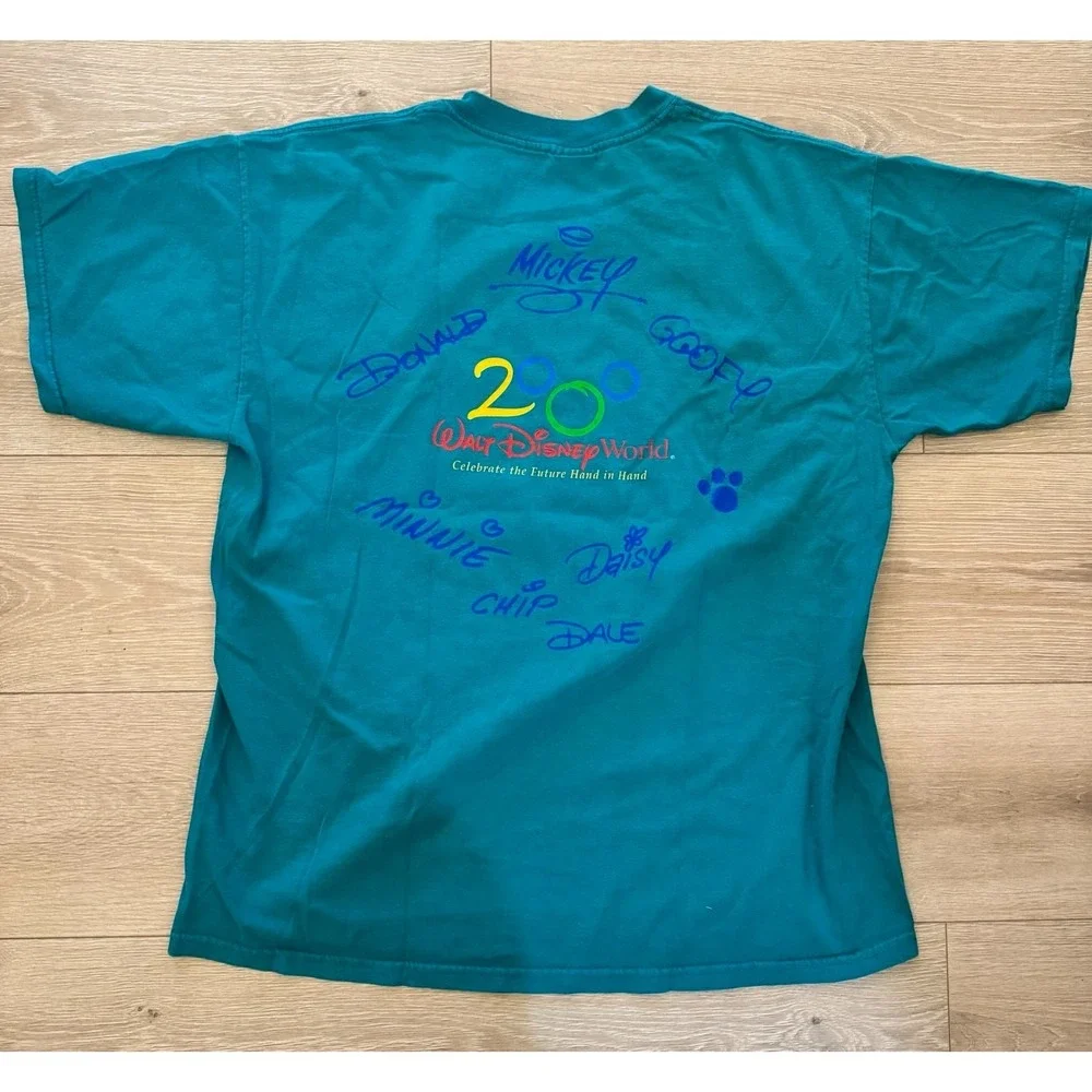Vintage 2000 Walt Disney World Celebrate the Future Hand in Hand Teal Shirt Sz L